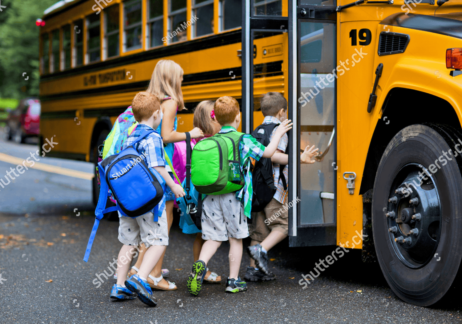 stock photo a group of young children getting on the schoolbus 153645101 pichi