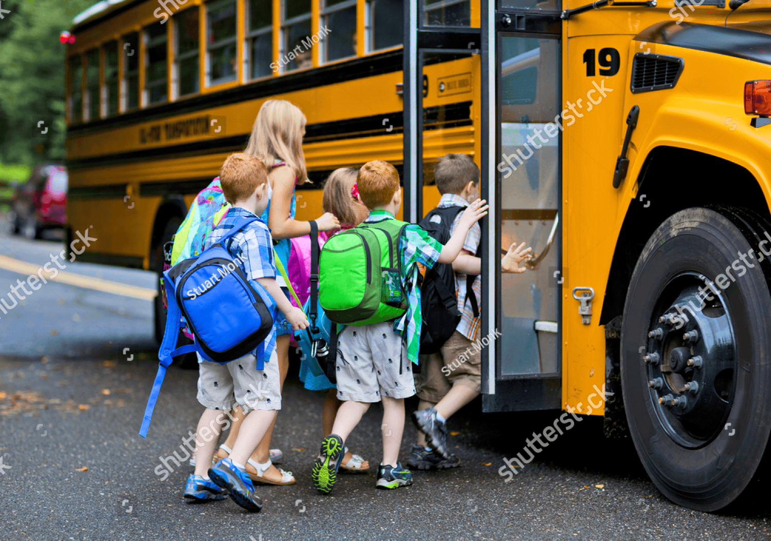 Home (v2) 6 stock photo a group of young children getting on the schoolbus 153645101 pichi