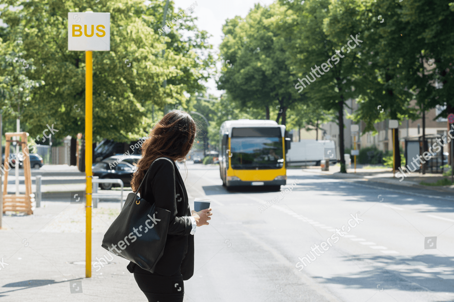 stock photo young businesswoman with disposal cup waiting for bus 471412502 pichi